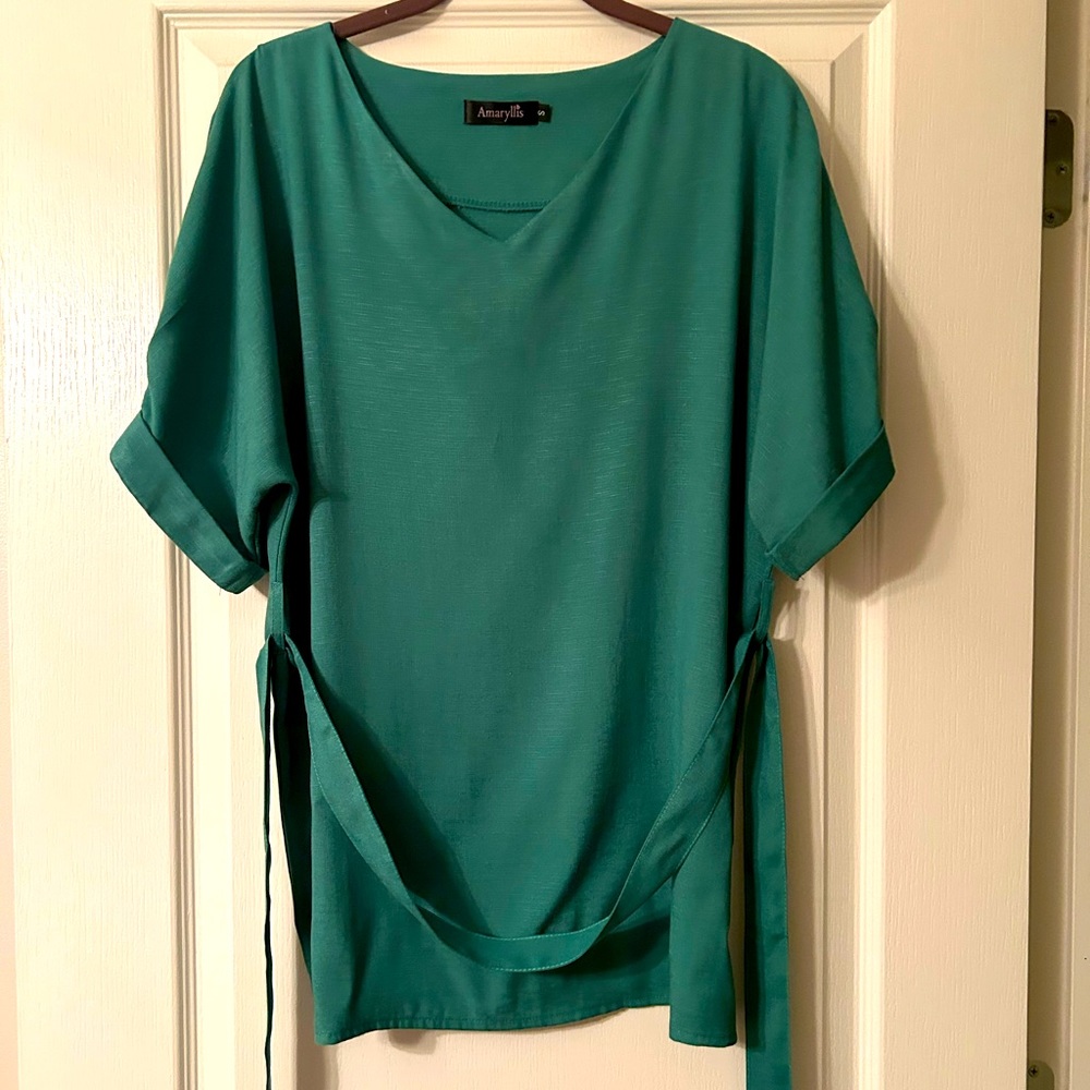 Amaryllis short sleeve linen shirt, w/a tie belt. More of a Kelley green color.
